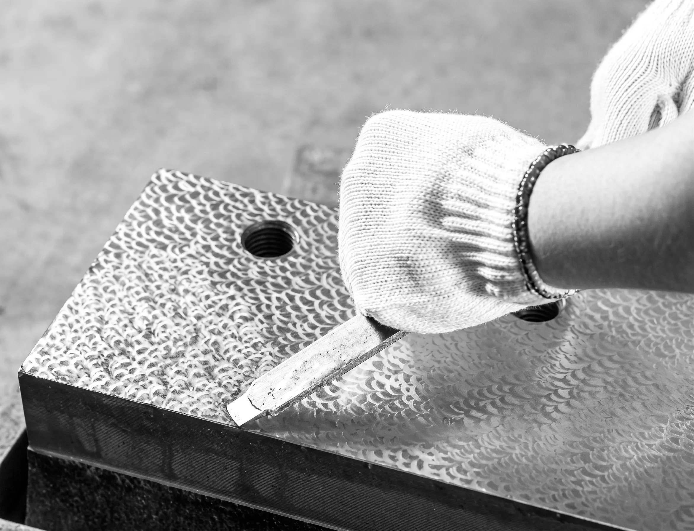 Hand scraping of machine bed mating surfaces for precision accuracy